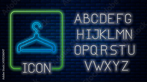 Glowing neon Hanger wardrobe icon isolated on brick wall background. Cloakroom icon. Clothes service symbol. Laundry hanger sign. Neon light alphabet. Vector
