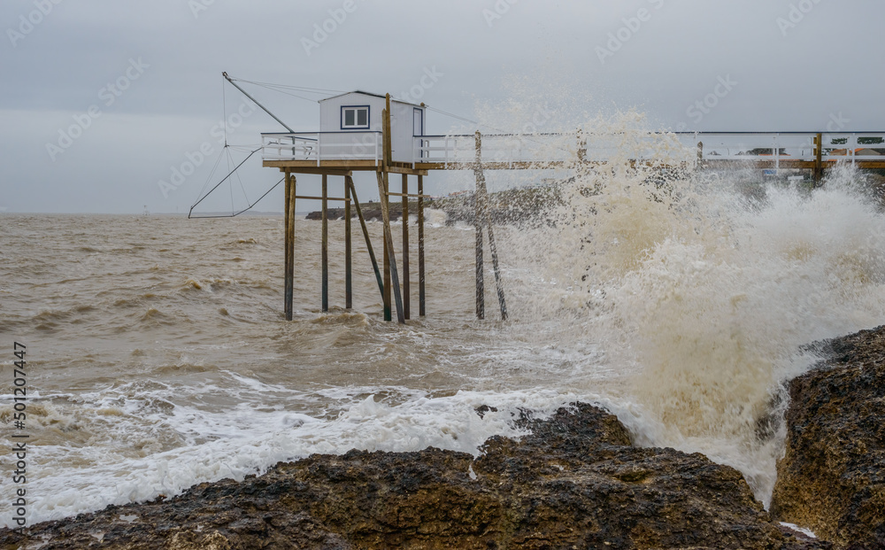 Stormy seas and ocean waves on rocky Atlantic coast at Charente-Maritime, France near La Rochelle