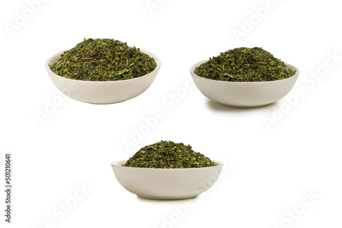 Dry mint in a bowl isolated.