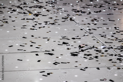 Black and White Party Confetti on the Floor of an Event Space