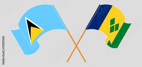 Crossed and waving flags of Saint Lucia and Saint Vincent and the Grenadines