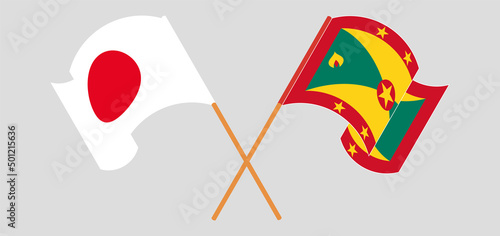 Crossed and waving flags of Japan and Grenada