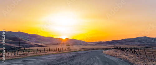 Blazing Sunset over central California rural road 