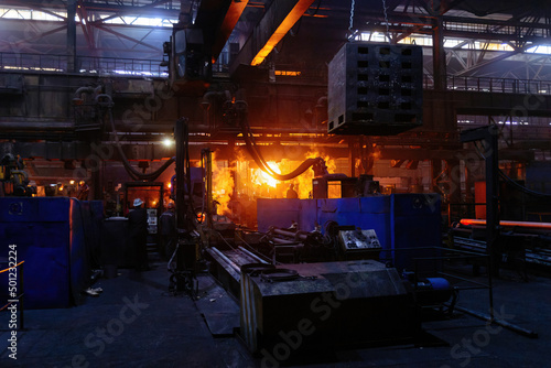 Process of Iron pipe casting at the foundry © Mulderphoto