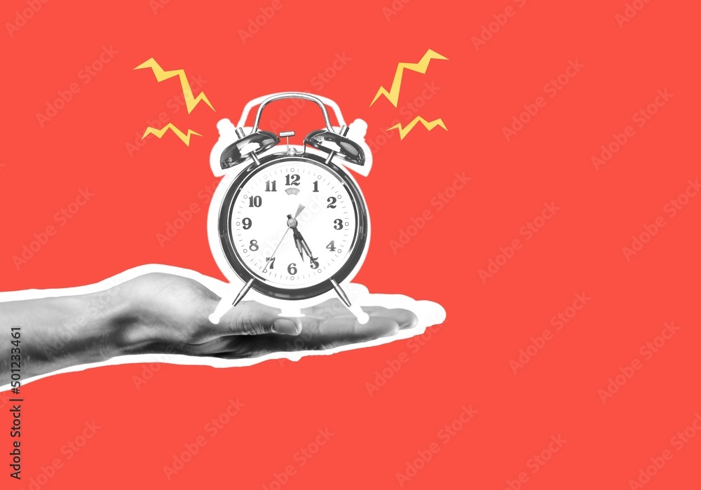 Human hand holding alarm clock on red background, idea concept - obrazy, fototapety, plakaty 