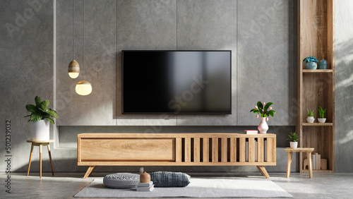 Foto Loft style in tv room interior wall mockup on concrete wall.