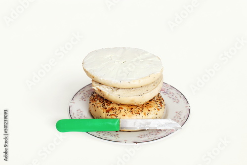 fresh baked bagels with cream cheese isolated on white background,top view  photo