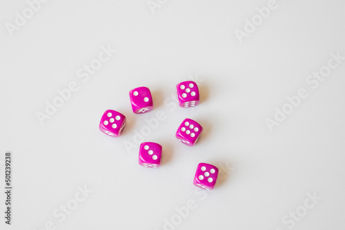 Concept of gambling and chance with dices on a white isolated background