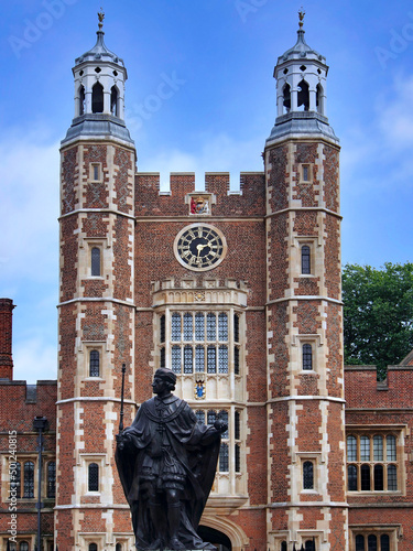 Eton, England :  Clocktower of Eton College, and elite private school, with staute of King Henry VI, its founder. photo