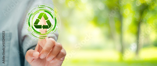 Hand touching on virtual screen recycle icon. Environmental concept recycle - reduce - reuse.