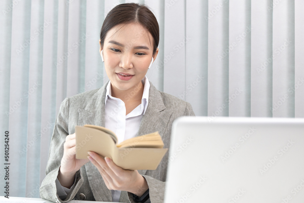 Head of marketing is recording the company's financial growth statistics using graphs as a reference for reviewing and analyzing the results, Taking notes and analyzing data graphs in office. Head of marketing is recording the company's financial growth statistics using graphs as a reference for reviewing and analyzing the results, Taking notes and analyzing data graphs in office.