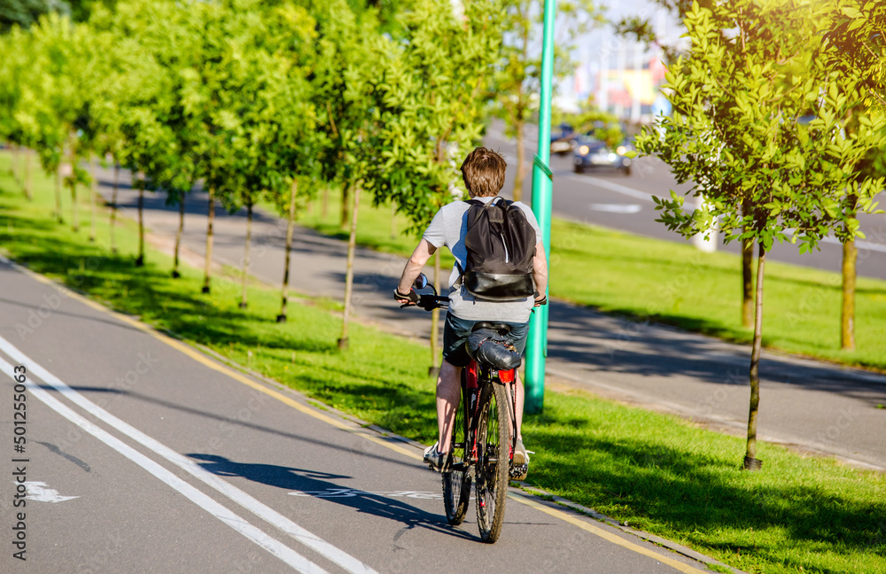 custom made wallpaper toronto digitalCyclist ride on the bike path in the city Park
