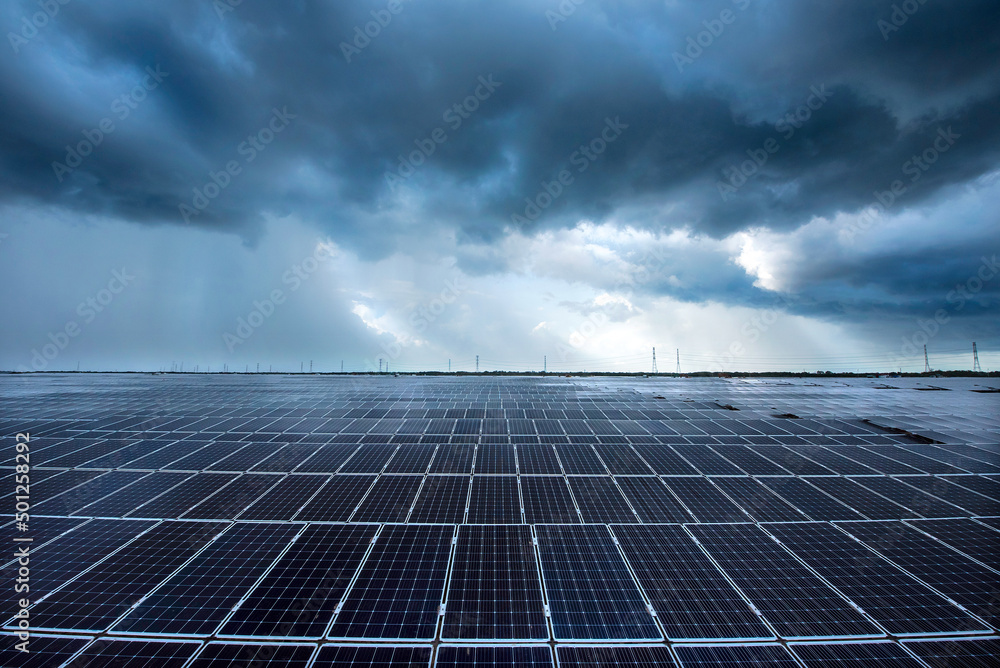 Photovoltaic modules solar power plant on dramatic sunset sky ...
