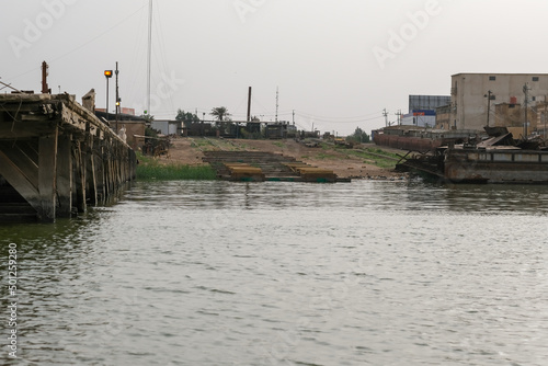 Basra, Iraq - April 15, 2022: landscape photo of the tour in river in basra city photo