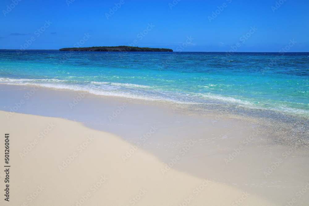 Sandy beach at Gee island in Ouvea lagoon, Loyalty Islands, New Caledonia