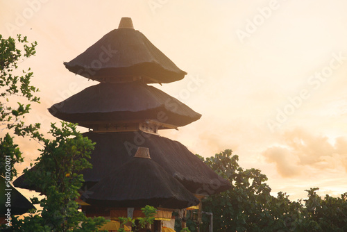 Uluwatu Temple at golden sunset. Bali. Indonesia photo