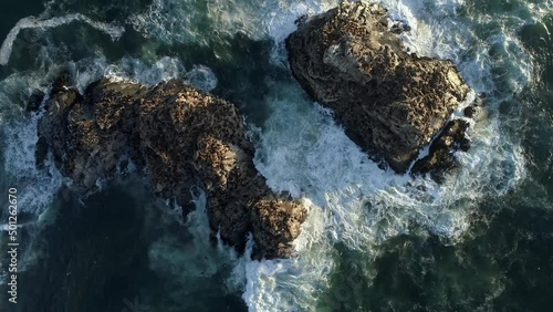 Bird's Eye View Over Cobquecura Piedra De La Loberia, Foamy Waves Splashing On Rock Formations In South Chile - drone shot