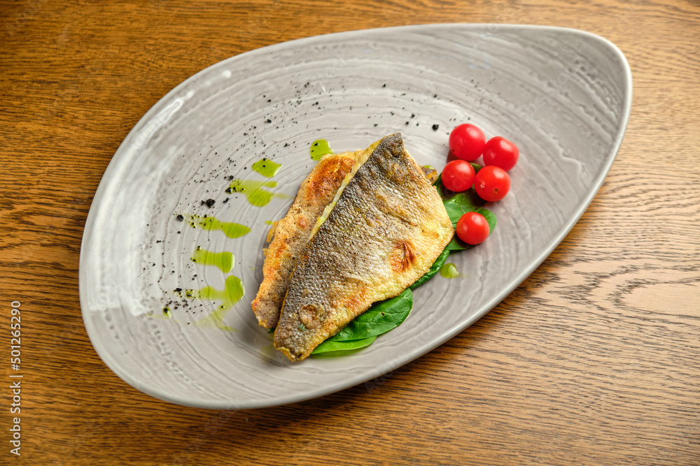 Fried fish fillet with tomatoes Fried fish fillet with tomatoes