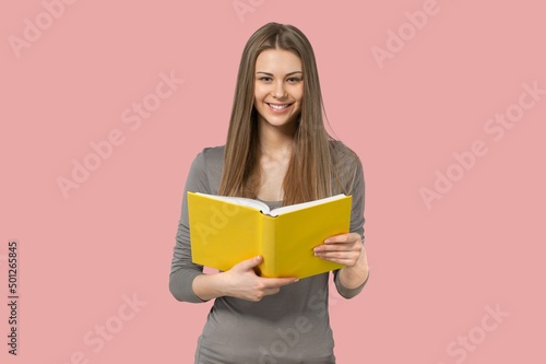 Young fun student woman wear shirt holding books notebooks © BillionPhotos.com