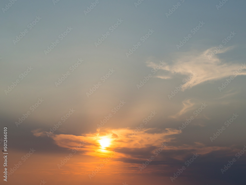 Picturesque view of the sky with clouds during sunset. Beautiful view of the cloudy sky at sunset. Fantastic bright clouds in the sunset sky. Sky background