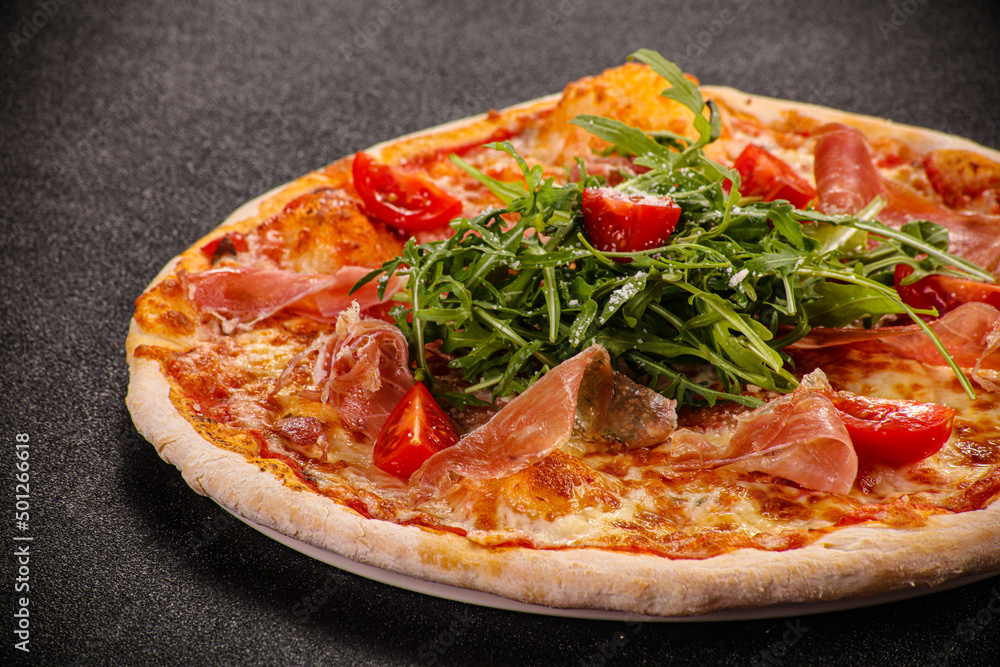 Pizza with parma and rucola