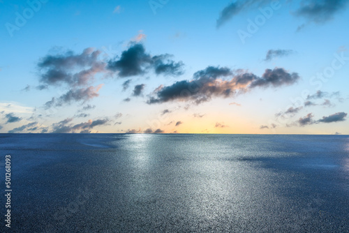 Asphalt road and colorful sky cloud landscapes at sunrise