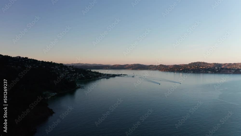 Wide aerial shot of San Francisco Bay and Sausalito at golden hour on a clear day. 4K Wide aerial shot of San Francisco Bay and Sausalito at golden hour on a clear day. 4K