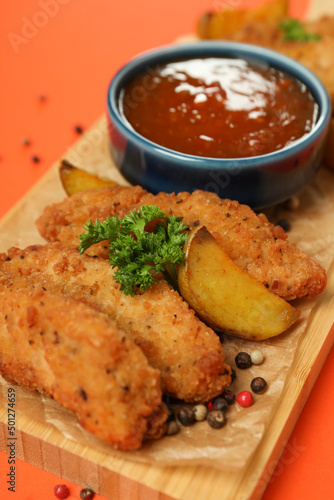 Concept of tasty food with chicken strips, close up