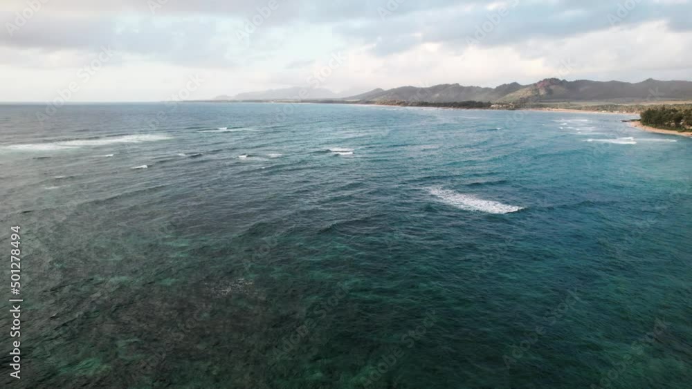 Clouds cover the south eastern shore of Kauai, Hawaii, beautiful destination, golden sand beaches, aerial Clouds cover the south eastern shore of Kauai, Hawaii, beautiful destination, golden sand beaches, aerial