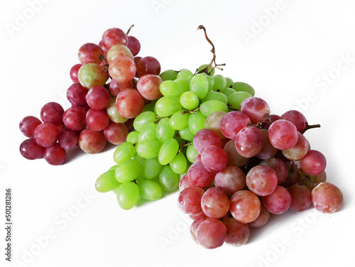 Tasty juice green and red Grapes branch isolated on white background