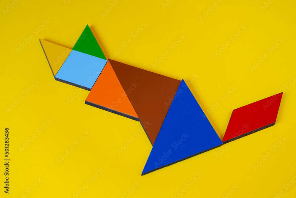 Tangram cat, top view of tangram animal cat, lay down, isolated on yellow  background, colorful tangram puzzle toy concept, colored shapes Stock Photo  | Adobe Stock