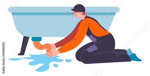 Plumber fixing water leakage in bathroom bathtub