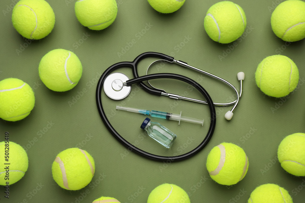 Tennis balls, stethoscope and drugs on green background, flat lay. Doping concept
