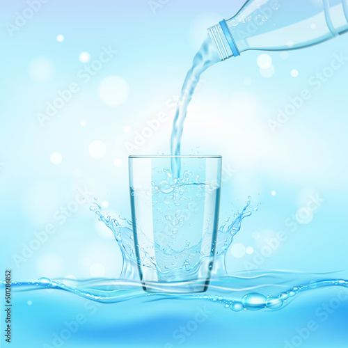Pouring water from a  transparent plastic bottle into a glass with splash on a blue background. 