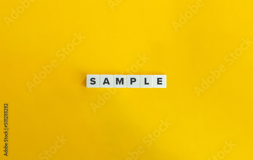 Sample Word on Letter Tiles on Yellow Background. Minimal Aesthetics.