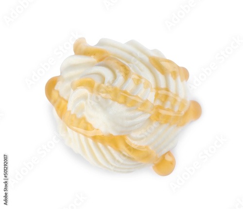 Delicious fresh whipped cream with caramel sauce isolated on white, top view