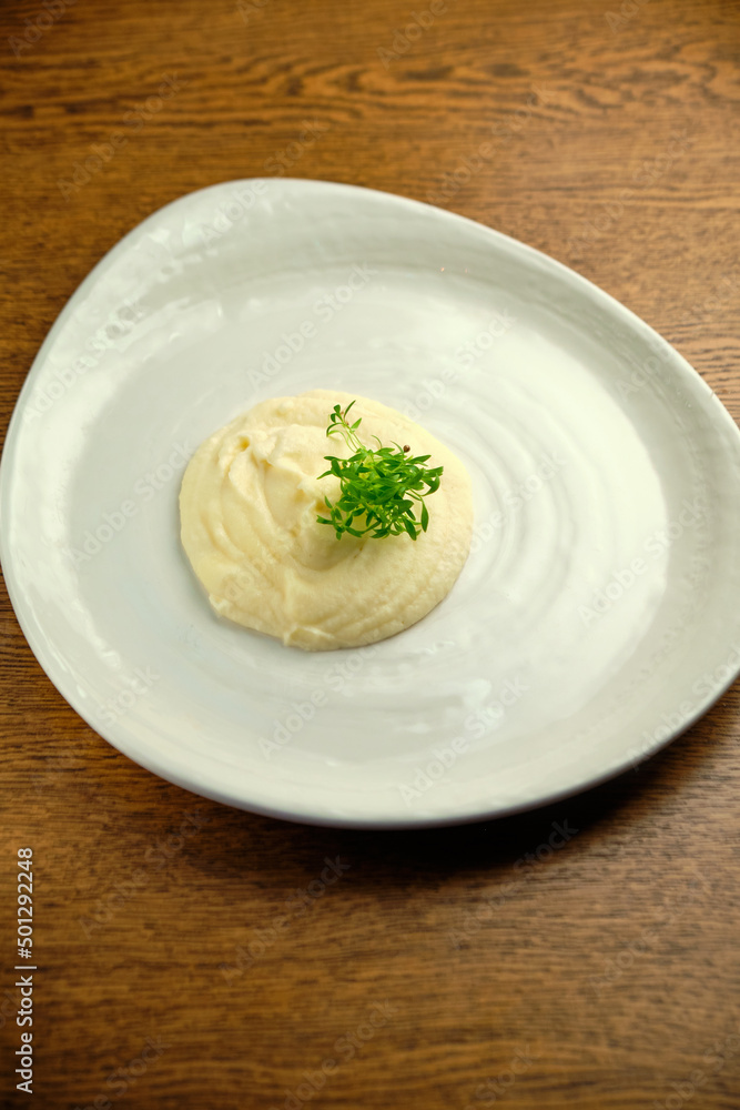 Risotto on a white restaurant plate