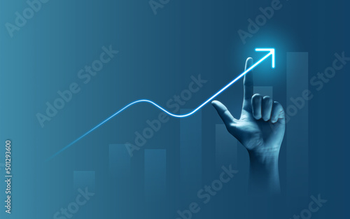 Businessman hand drawing light arrow graph icon finance success business background diagram of growth financial chart development or growing economic and goal achievement symbol on marketing strategy.