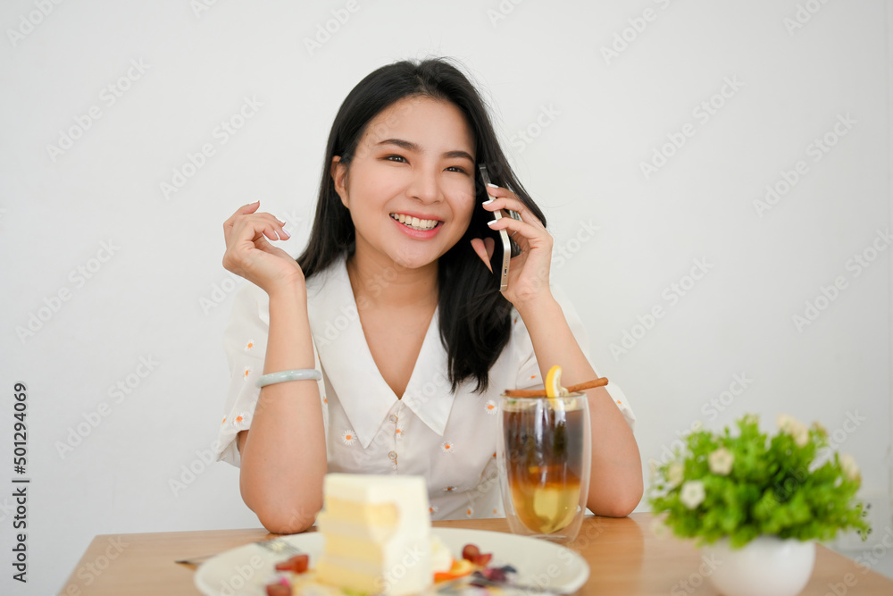 Beautiful woman enjoy talking on the phone call with her friends
