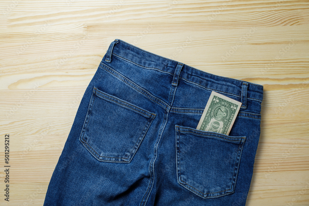 one dollar in the back pocket of jeans. money in your pocket one dollar in the back pocket of jeans. money in your pocket