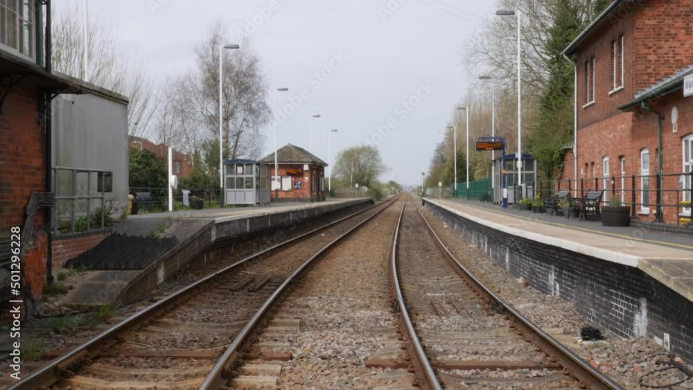 Empty closed old village railway station in England Empty closed old village railway station in England