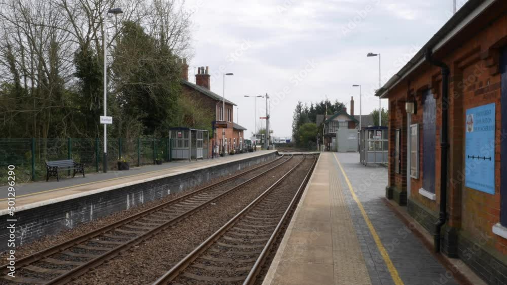Empty quiet old village railway station in England Empty quiet old village railway station in England