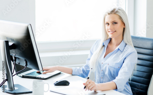 Young Woman Works at Home Office Using Computer. Workplace of Female Entrepreneur  Freelancer or Student. Remote Work and Education Concept.