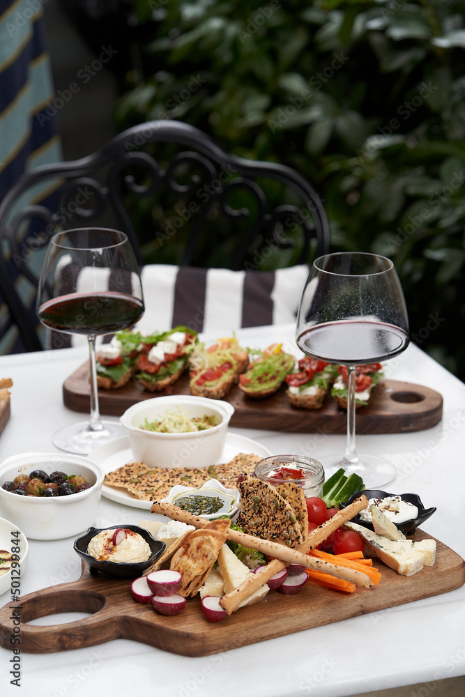 Italian antipasti wine snacks on table, outdoor party