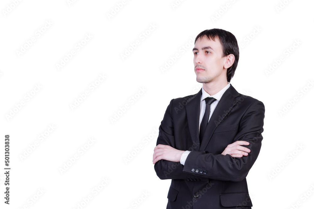 Confident in his abilities, the manager of the company stands with his hands crossed on his chest Confident in his abilities, the manager of the company stands with his hands crossed on his chest