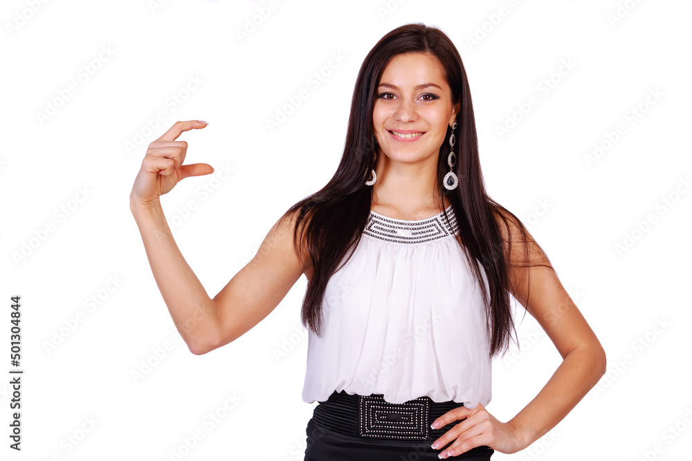 A young charming girl holds a small imaginary object with her fingers A young charming girl holds a small imaginary object with her fingers