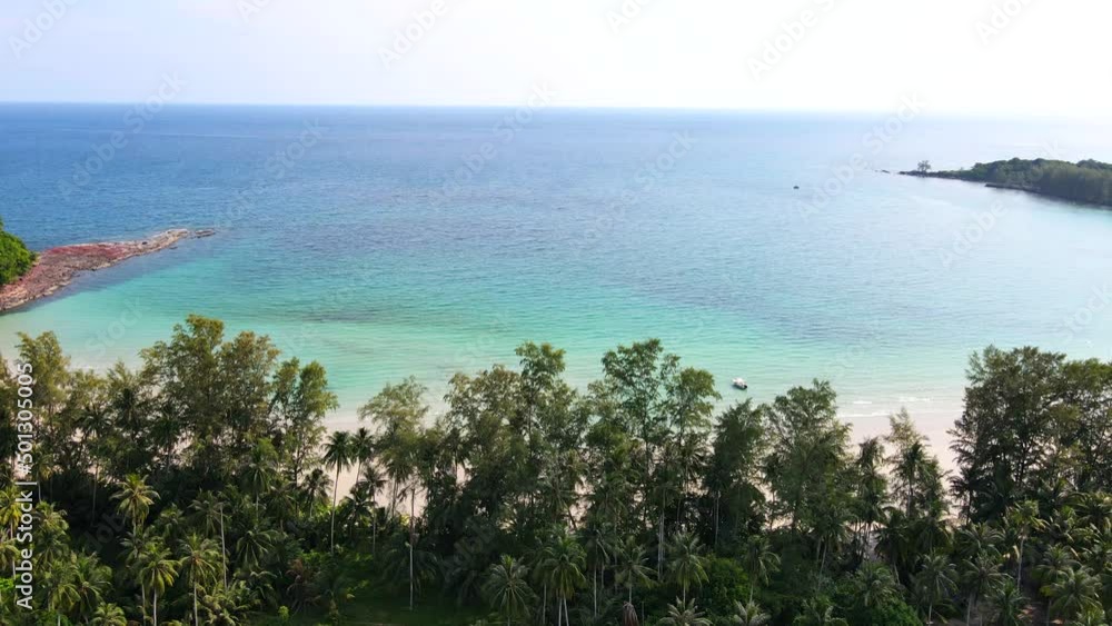 Aerial view of nature tropical paradise island beach enjoin a good summer beautiful time on the beach with clear water and blue sky in Koh kood or Ko Kut, Trat Thailand. Aerial view of nature tropical paradise island beach enjoin a good summer beautiful time on the beach with clear water and blue sky in Koh kood or Ko Kut, Trat Thailand.