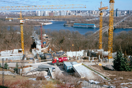 A large construction site in Kyiv next to the Dnieper River