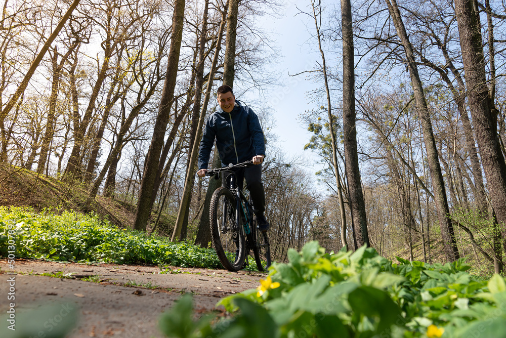 Naklejka premium Man riding on mountain bike