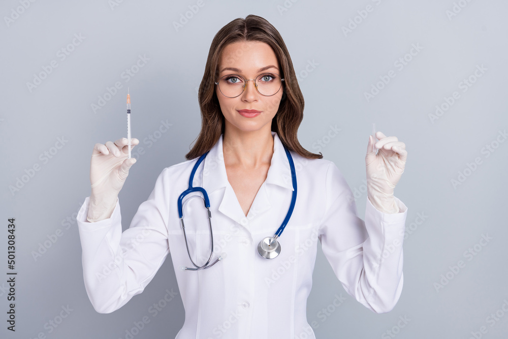 Photo of lady therapist recommend stop spread covid infection vaccinate patient green certificate get isolated grey color background Photo of lady therapist recommend stop spread covid infection vaccinate patient green certificate get isolated grey color background